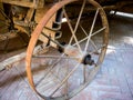 Old metal cart wheel from an old wagon Royalty Free Stock Photo