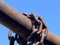 old metal chain with blue sky Royalty Free Stock Photo