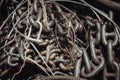 Old metal chain links stocked in store. Chains for heavy industrial use, Iron chain texture background