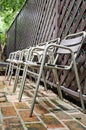 Old metal chair on brick floor