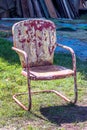 Old metal chair with peeling paint Royalty Free Stock Photo