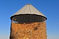 Metal corn crib full of harvested ears of corn Royalty Free Stock Photo