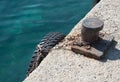 Old metal dock mooring pole Royalty Free Stock Photo