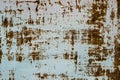 Old metal door with cracks and rust. Grunge rusted metal background. Cracked paint texture. Royalty Free Stock Photo