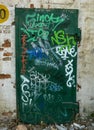 Old metal door with graffiti in pula, Istria, Croatia