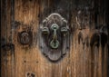 Old metal door handle knocker Royalty Free Stock Photo