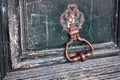 Old metal door handle knocker Royalty Free Stock Photo