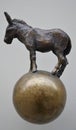 Old metal door handle made as small donkey statue Royalty Free Stock Photo