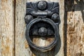 Timeless Elegance: Vintage Metal Door Knocker on Wooden Door Royalty Free Stock Photo