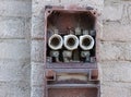 An old metal electrical fuse box serving as the main distribution center and primary safety for the electrical system Royalty Free Stock Photo
