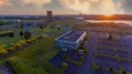 Old metal factory chimney in Caen - Colombelles, Normandy, drone photo at sunset, industrial area