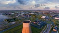 Old metal factory chimney in Caen -Colombelles, Normandy, drone photo at sunset, industrial area