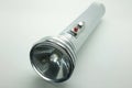Old metal flashlight, silver torch Royalty Free Stock Photo