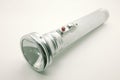 Old metal flashlight, silver torch Royalty Free Stock Photo