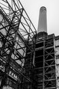 Wide-Shot of an Old Metal Frame with a White Chimney at Battersea Power Station