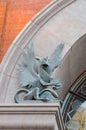 Old Metal Gargoyle on Arched Doorway