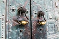 old metal iron door with the handle knocker Royalty Free Stock Photo