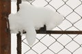Old metal latch with snow