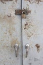 Old metal lock on the grunge door Royalty Free Stock Photo