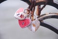 Old metal lovers locks in heart shaped with rusty hanging on the steel bridge background Royalty Free Stock Photo