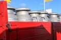 Old milk churns on vintage lorry