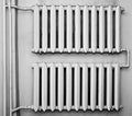 Old metal radiators on wall Royalty Free Stock Photo