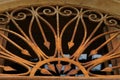 An old metal railing on a wooden door Royalty Free Stock Photo