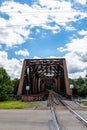 An old metal railroad bridge belonging to the Allegheny Railroad crossing the Allegheny River in Warren, Pennsylvania, USA Royalty Free Stock Photo