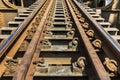 Old metal railway on steel train bridge Royalty Free Stock Photo