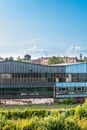 Old, metal, rusted factory hall situated in industrial district in a city. Royalty Free Stock Photo