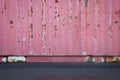 Old metal sheet roof texture or old cargo container wall with concrete floor or asphalt road. Royalty Free Stock Photo