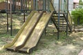 An old metal slide in playground Royalty Free Stock Photo