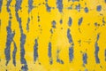 Old metal texture. Galvanized iron surface with peeling yellow paint.