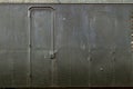 The exterior of an old metal shed made of sheet steel with rivets, a production method from days gone by. Royalty Free Stock Photo