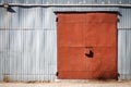 Old metal warehouse door, hangar gate Royalty Free Stock Photo