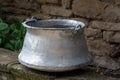 Old metal water container in the garden- traditional Bulgarian copper water container bakir. Used to bring water from the well.