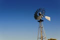 Old  metal windmill in a farm Royalty Free Stock Photo