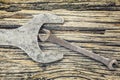 Old metallic spanners on wooden table Royalty Free Stock Photo