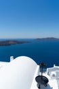 Old metallic tool for decoration on a white roof. Santorini island, Greece