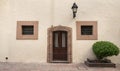 Old mexican house facade, Colonial style door and windows Royalty Free Stock Photo