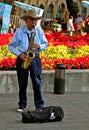 Old Mexican Musician Playing Saxophone