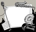 Old microphone, gramophone, and saxophone with a paper sheet banner Royalty Free Stock Photo