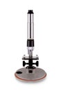 Old microscope isolated Royalty Free Stock Photo