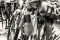 Old military bicycle with kitbag and equipments, black and white Royalty Free Stock Photo