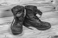 Old military boots in black and white. Royalty Free Stock Photo