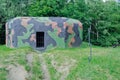 Old military bunker on the forest edge Royalty Free Stock Photo