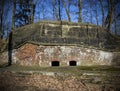Old military bunker in forest. Royalty Free Stock Photo