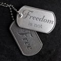 Old military dog tags - Freedom is not Free Royalty Free Stock Photo