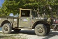 Old military jeep parked in front of Corsairs Beach Bar and Restaurant, Great Harbour, Jost Van Dyke, BVI