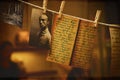 Old military letters with a photo on a clothesline with clothespins